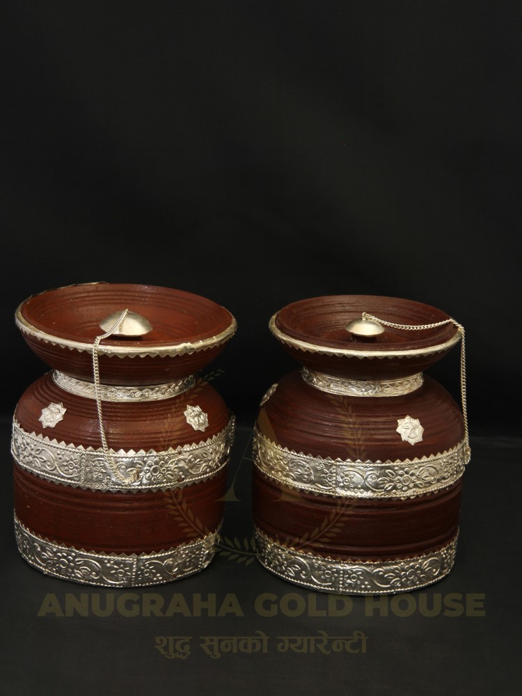 Theki decorated with Silver